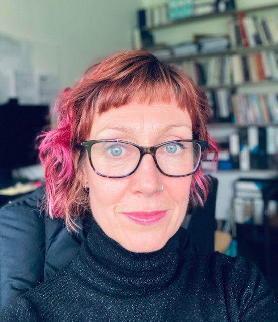 University of Worcester logo on a light blue background