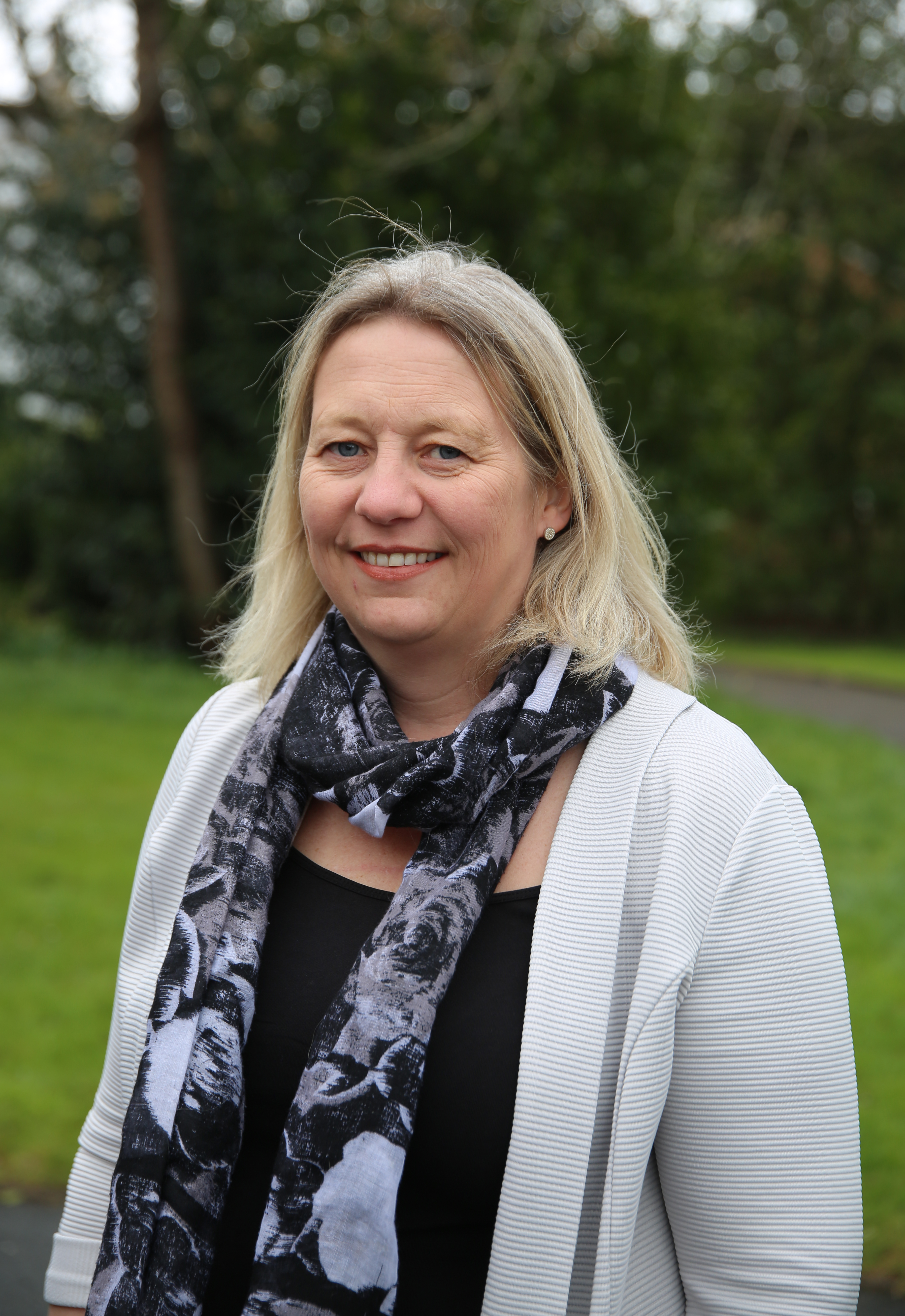 University of Worcester logo on a light blue background