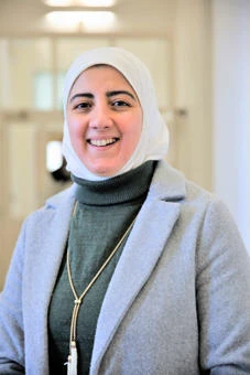 University of Worcester logo on a light blue background