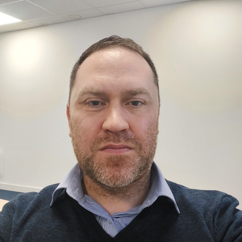 University of Worcester logo on a light blue background