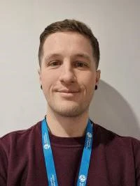 University of Worcester logo on a light blue background