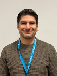 University of Worcester logo on a light blue background