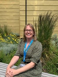 University of Worcester logo on a light blue background