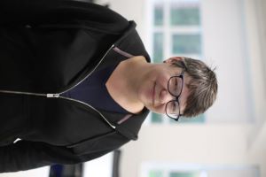 University of Worcester logo on a light blue background