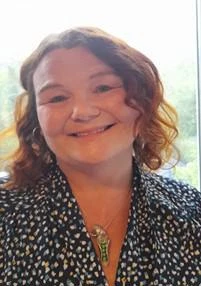 University of Worcester logo on a light blue background