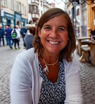 University of Worcester logo on a light blue background