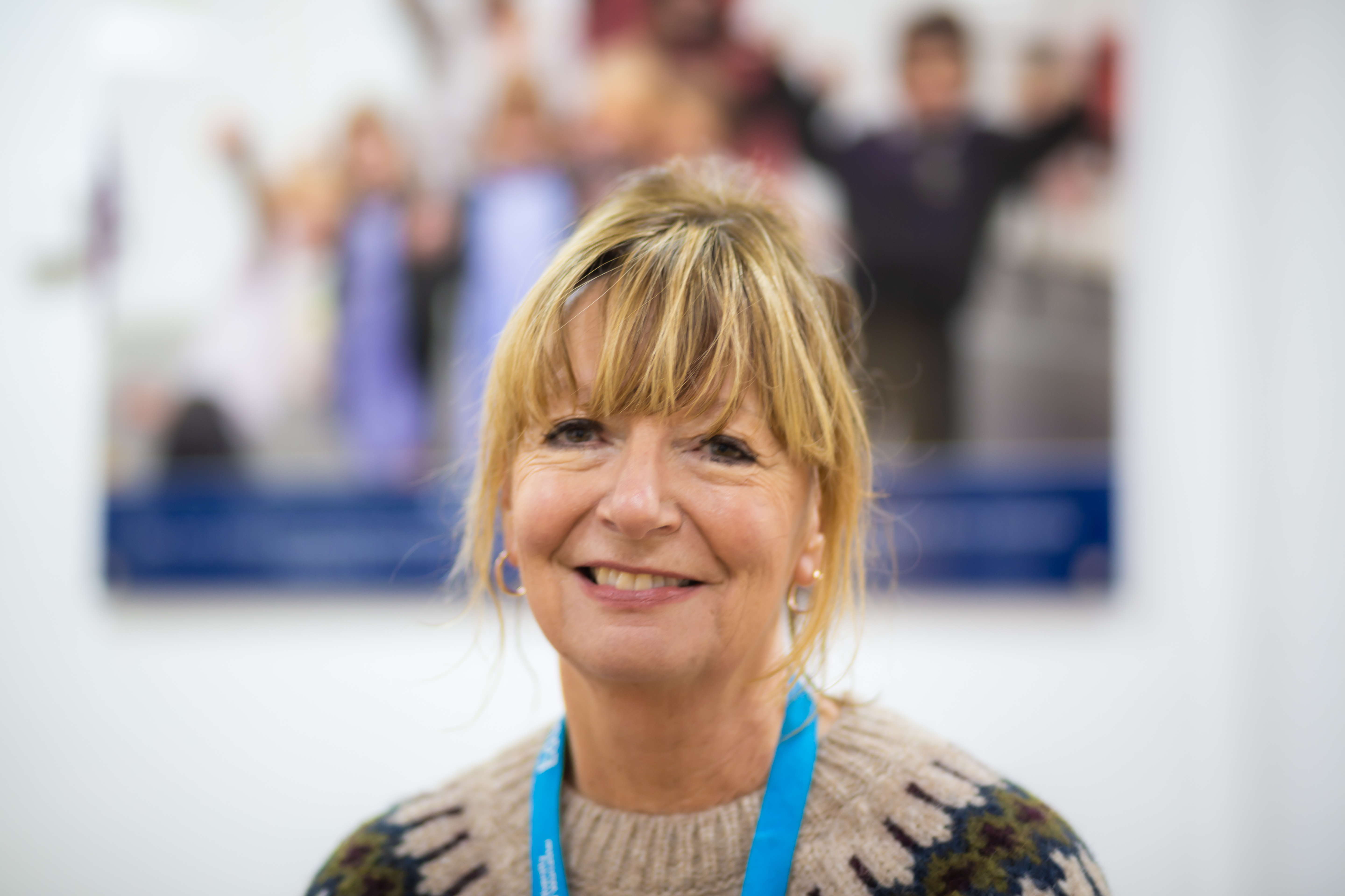 University of Worcester logo on a light blue background