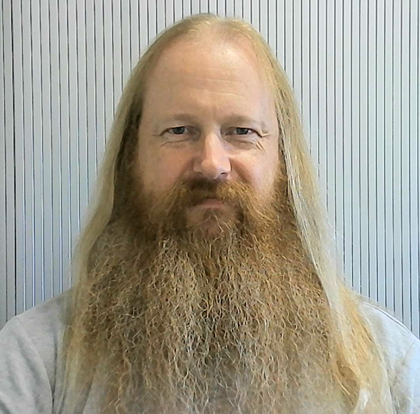 University of Worcester logo on a light blue background