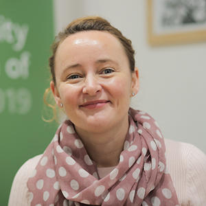 Caroline Thomas Meredith smiling at camera