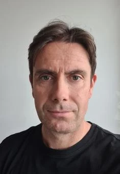 University of Worcester logo on a light blue background