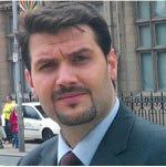 University of Worcester logo on a light blue background