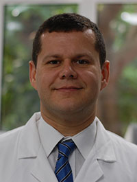 University of Worcester logo on a light blue background