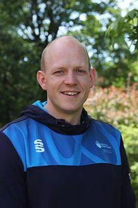 University of Worcester logo on a light blue background