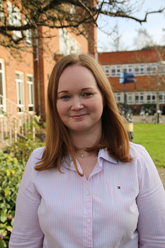 University of Worcester logo on a light blue background