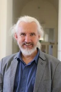 University of Worcester logo on a light blue background