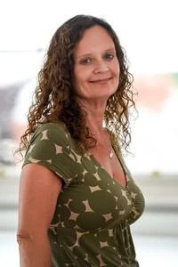 University of Worcester logo on a light blue background