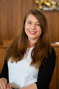 University of Worcester logo on a light blue background