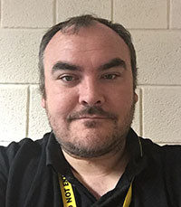 University of Worcester logo on a light blue background