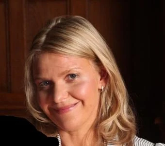 University of Worcester logo on a light blue background