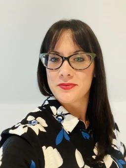 University of Worcester logo on a light blue background