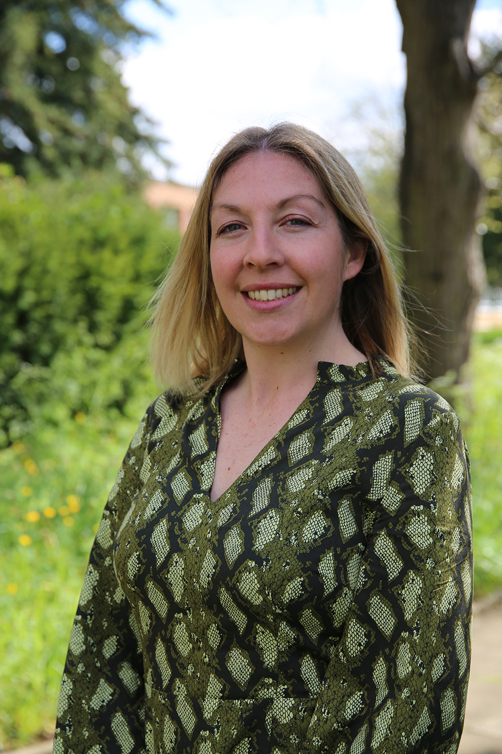 University of Worcester logo on a light blue background