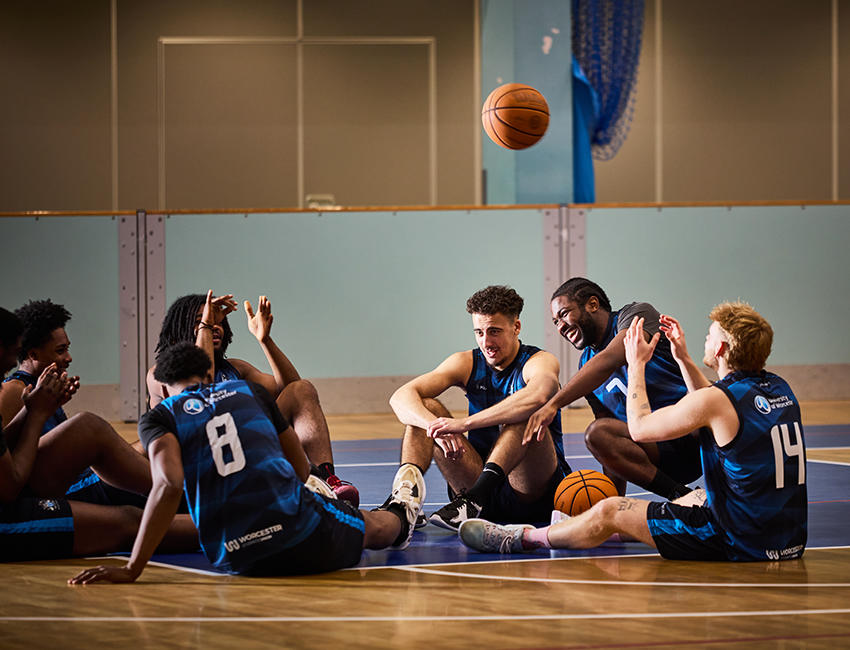 Basketball society chatting in the University arena