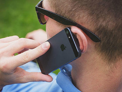 A person is on the telephone