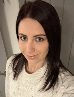 University of Worcester logo on a light blue background