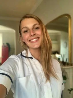 University of Worcester logo on a light blue background