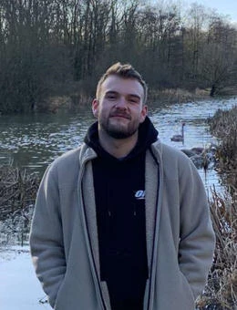 University of Worcester logo on a light blue background