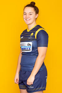 Photo of a student standing in sports kit