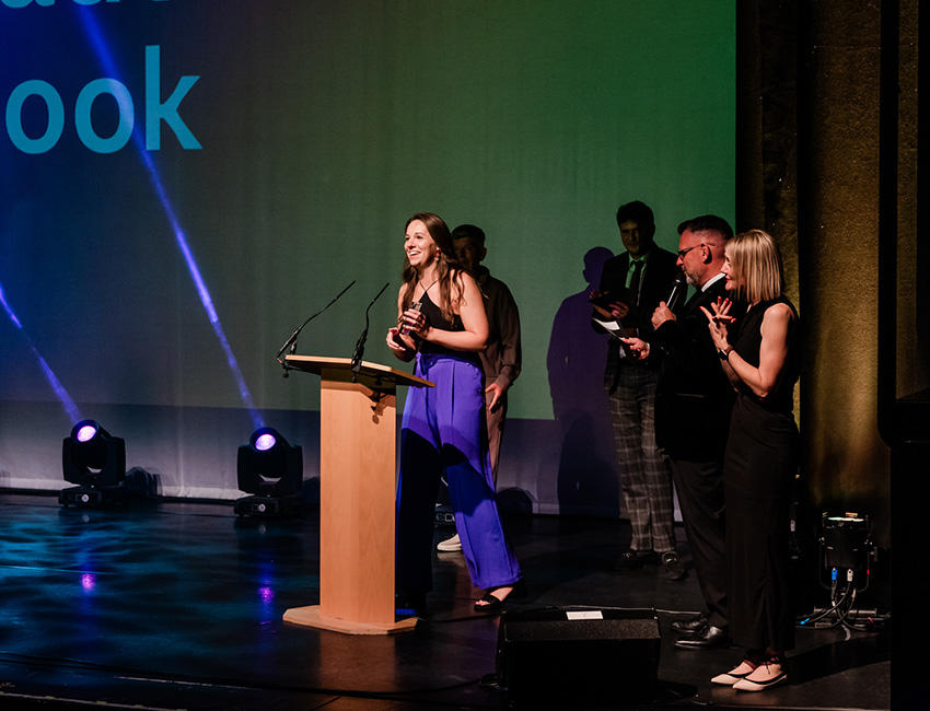 Jade Cook recieving their award