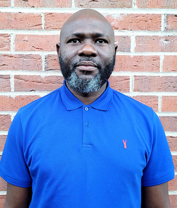 University of Worcester logo on a light blue background