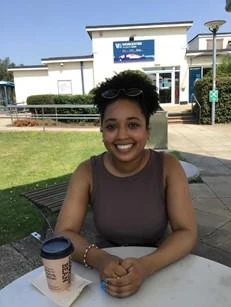 University of Worcester logo on a light blue background