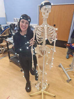 University of Worcester logo on a light blue background