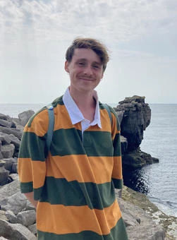 University of Worcester logo on a light blue background