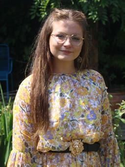 University of Worcester logo on a light blue background