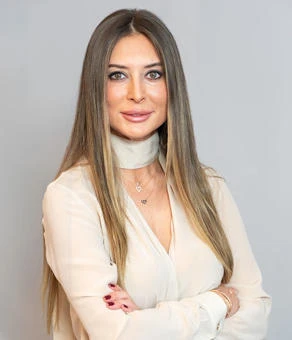 University of Worcester logo on a light blue background