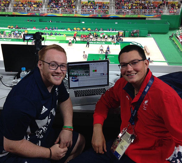 Dr Jon Francis and colleague at at a wheelchair basketball event