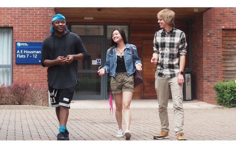 Group of students walking on campus