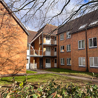 View of standard accommodation on a sunny day