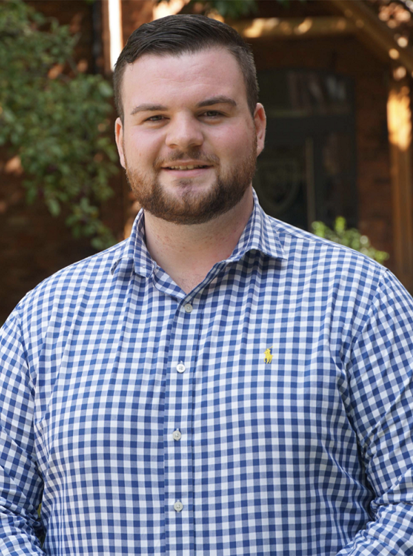 bearded man in blue and white check shirt