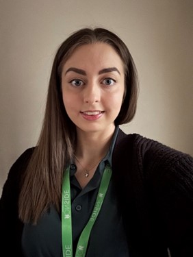 University of Worcester logo on a light blue background