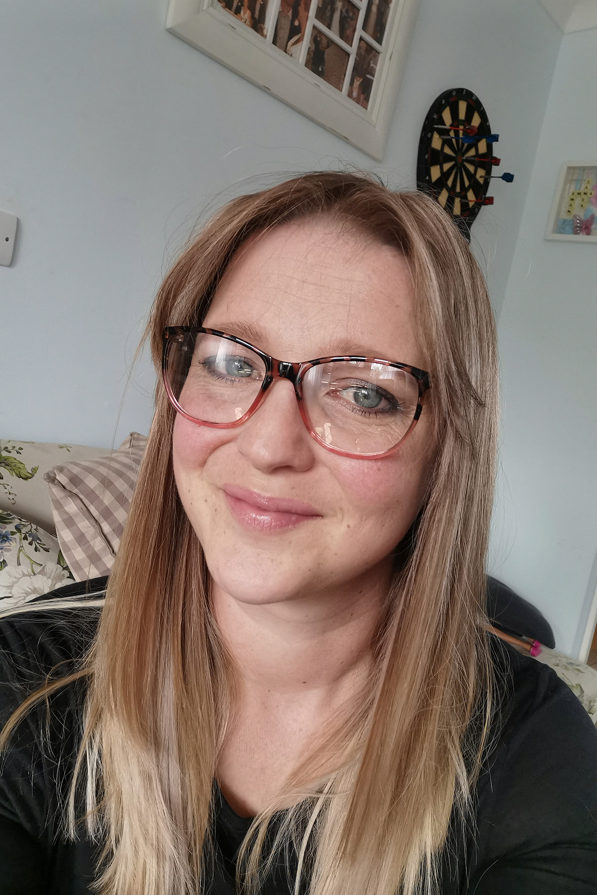 University of Worcester logo on a light blue background