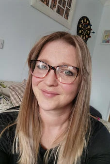 University of Worcester logo on a light blue background