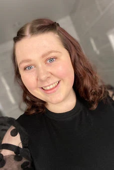 University of Worcester logo on a light blue background