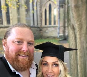 University of Worcester logo on a light blue background