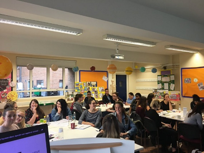 students at desks in the classroom