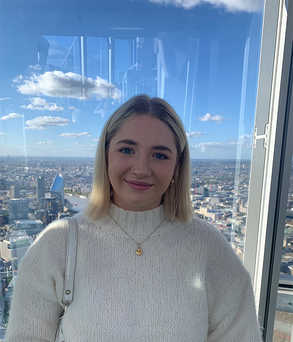 University of Worcester logo on a light blue background