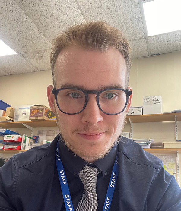 University of Worcester logo on a light blue background